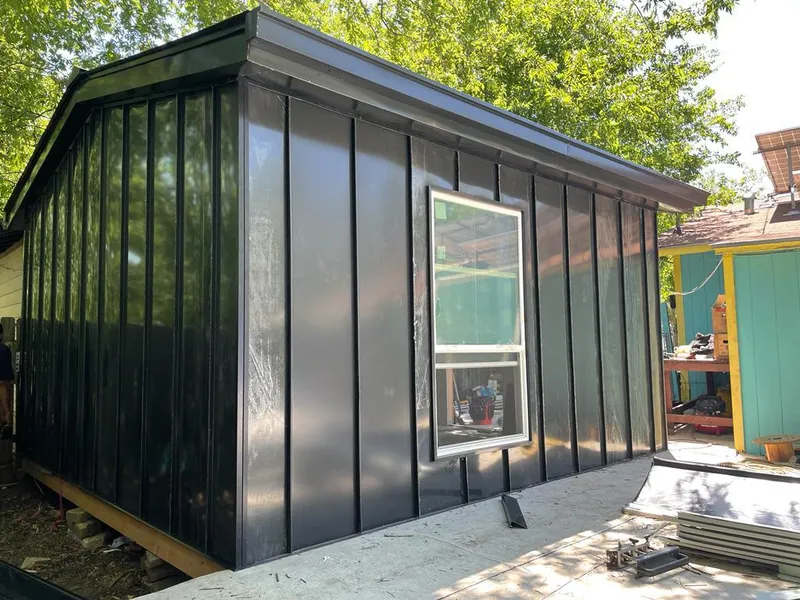 Black standing seam metal wall panels for Metal Roof Installation in Clearfield