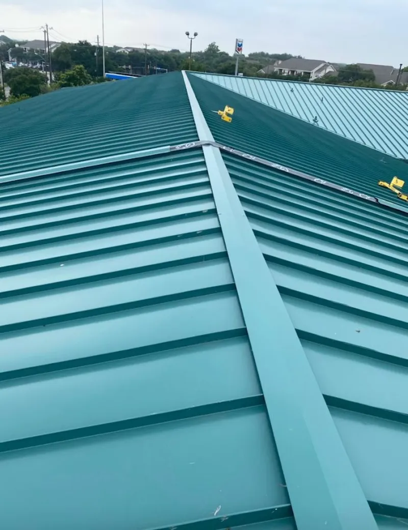 Green commercial metal roof ridge and valley for Metal Roof Repair in Clearfield